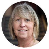 Karen Revill Headshot in circle frame