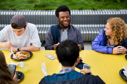 Students receiving support from a group advising session