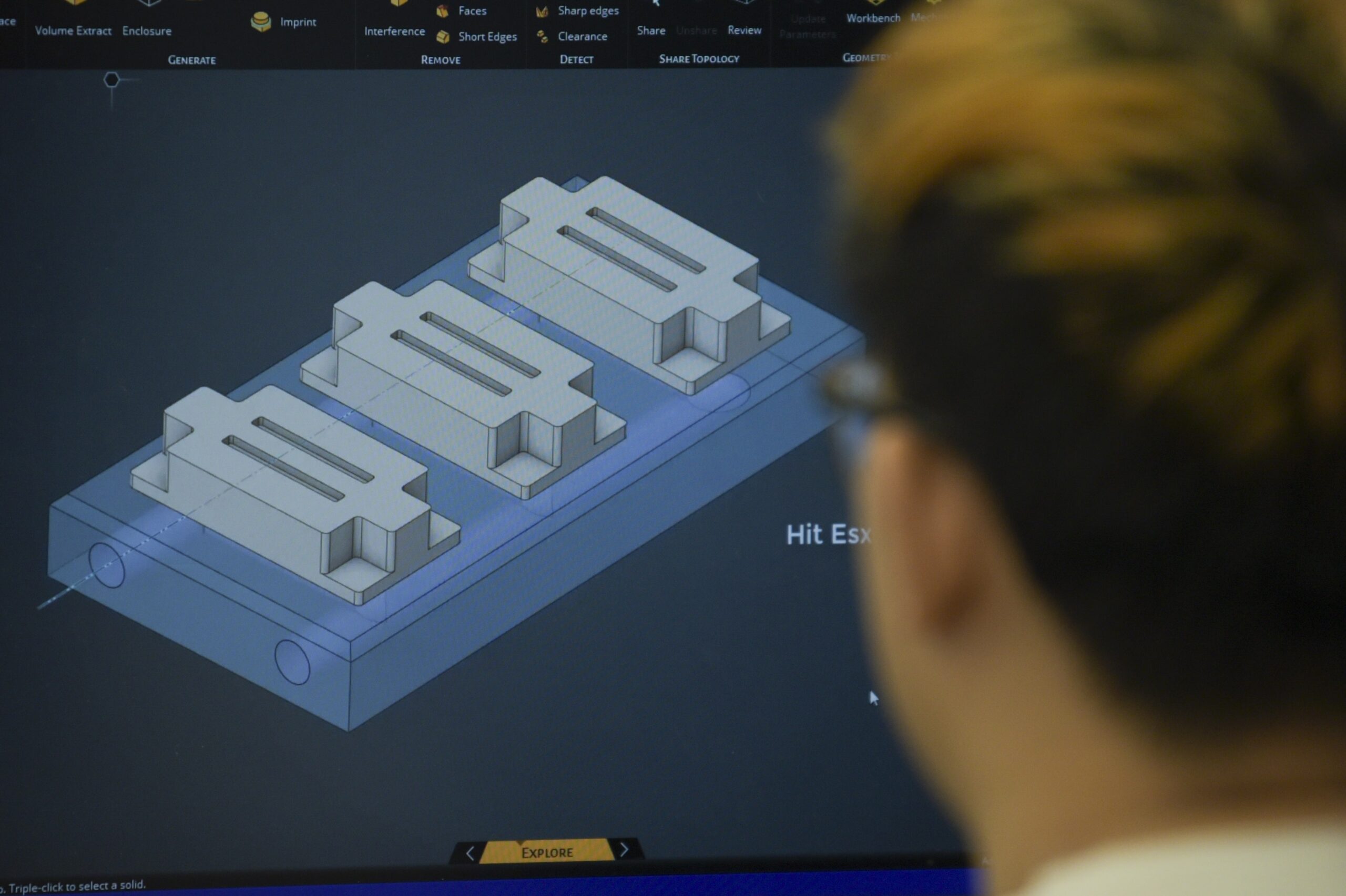 Drawing of a robot holding sign that says “I love ENGR 100” on whiteboard
