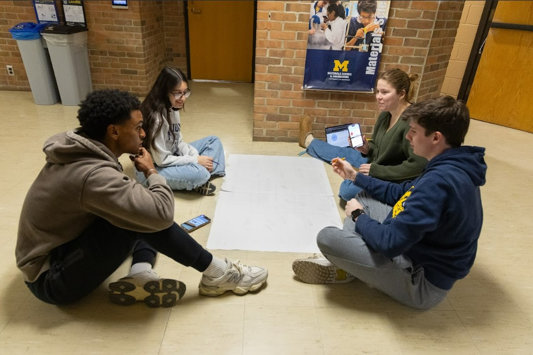 student using a drill